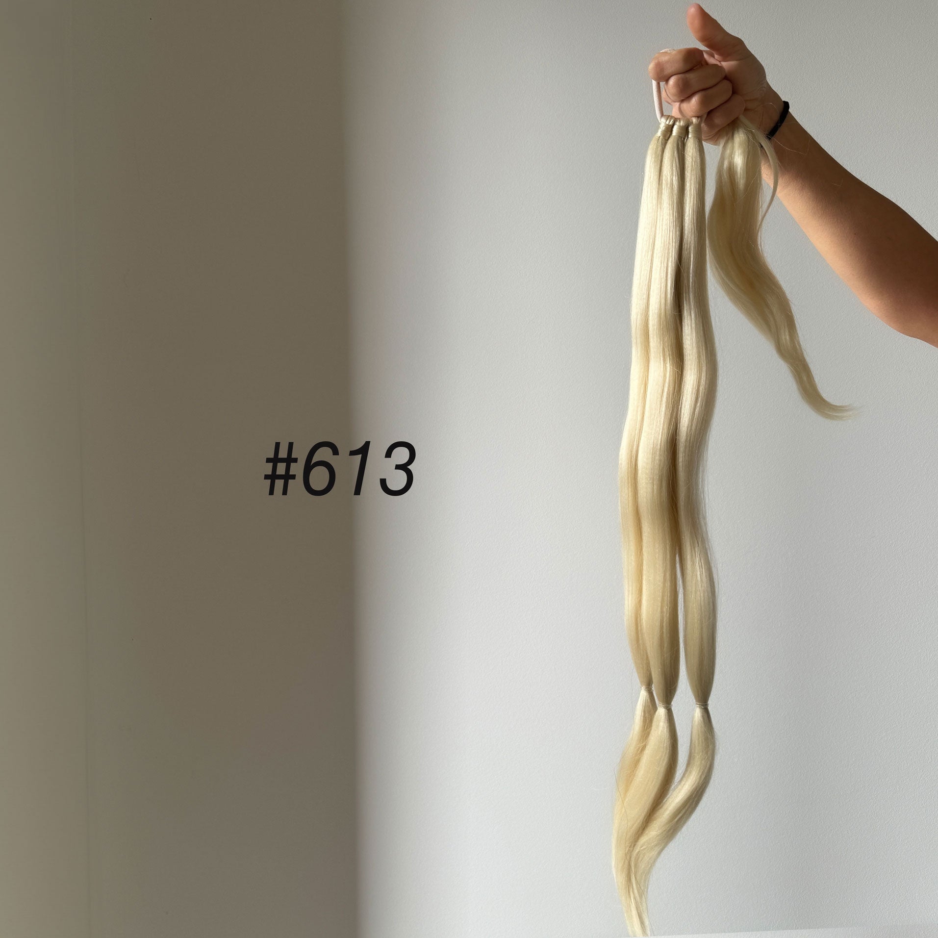 two braids into ponytails