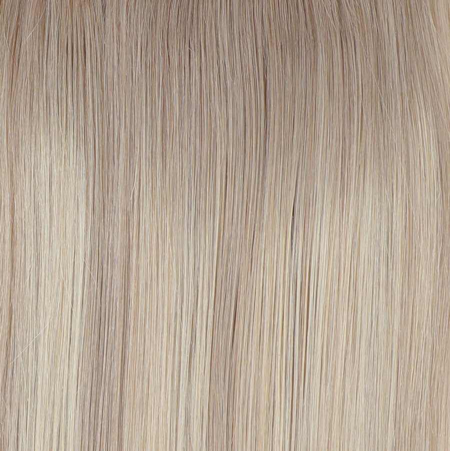 Close-up of light brown hair extensions