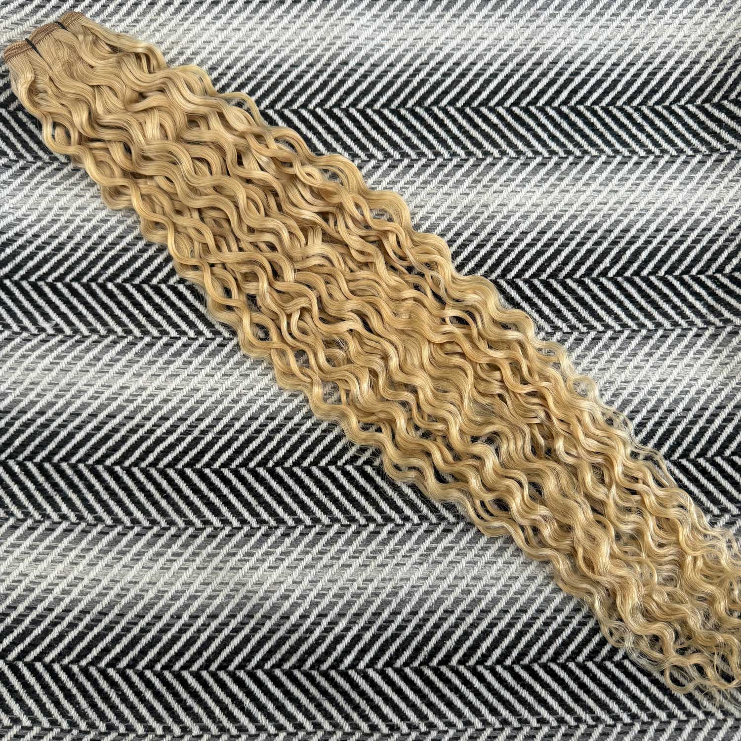 Blonde curly Hair Extensions in a bundle