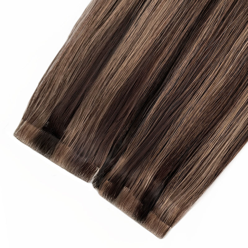 Skin Weft Hair Extensions are perfect for adding length and volume, providing a natural-looking finish. These high-quality extensions blend seamlessly with your natural hair.