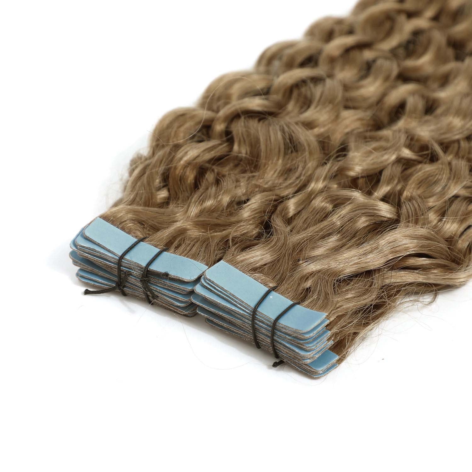 Bundle of dirty blonde hair extensions with blue tape on a white background