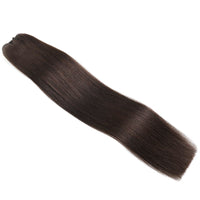 Brown hair extension on a white background
