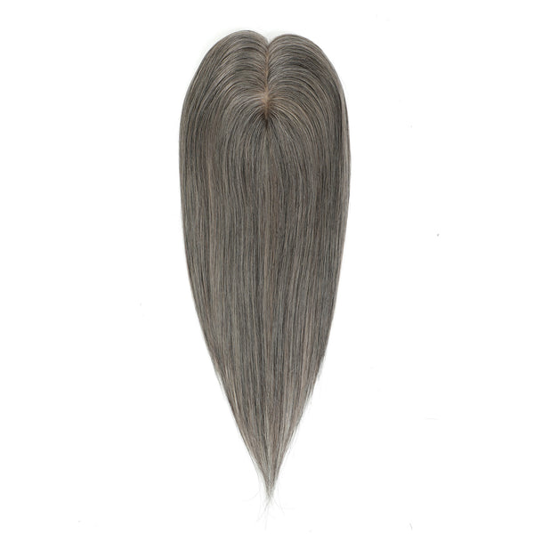 Gray hairpiece on a white background