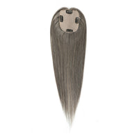 Long gray hair extension on a white background