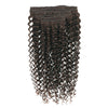 Set of curly hair extensions on a white background