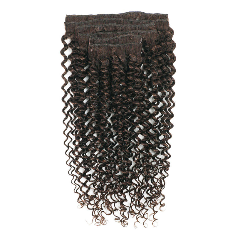 Set of curly hair extensions on a white background