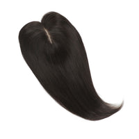 Black hair extension on a white background