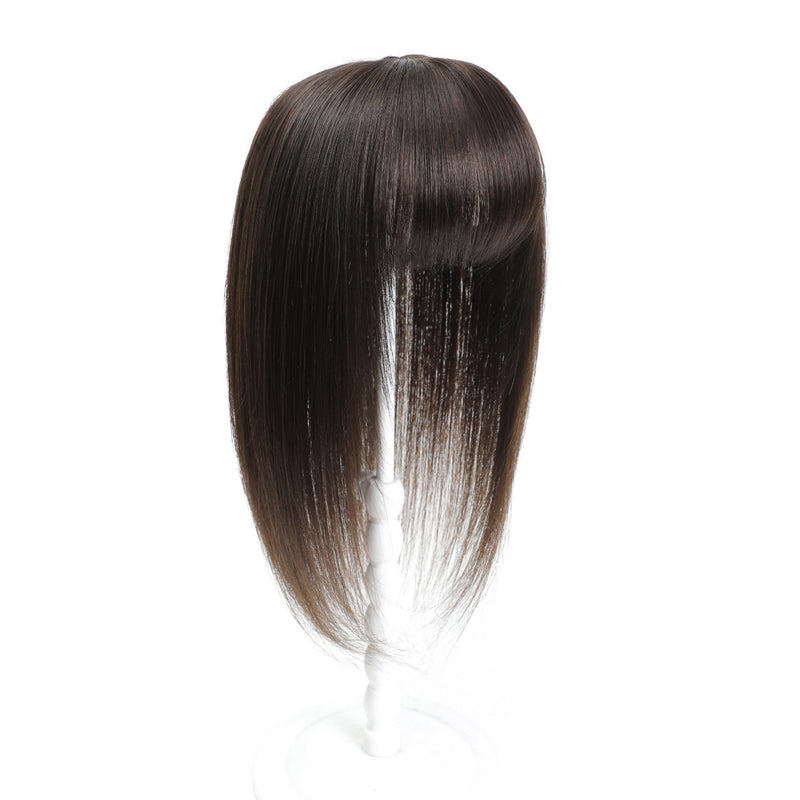 Brown hair extension on a white background