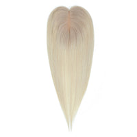 Blonde hair extension on a white background