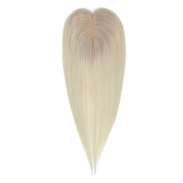 Blonde hair extension on a white background