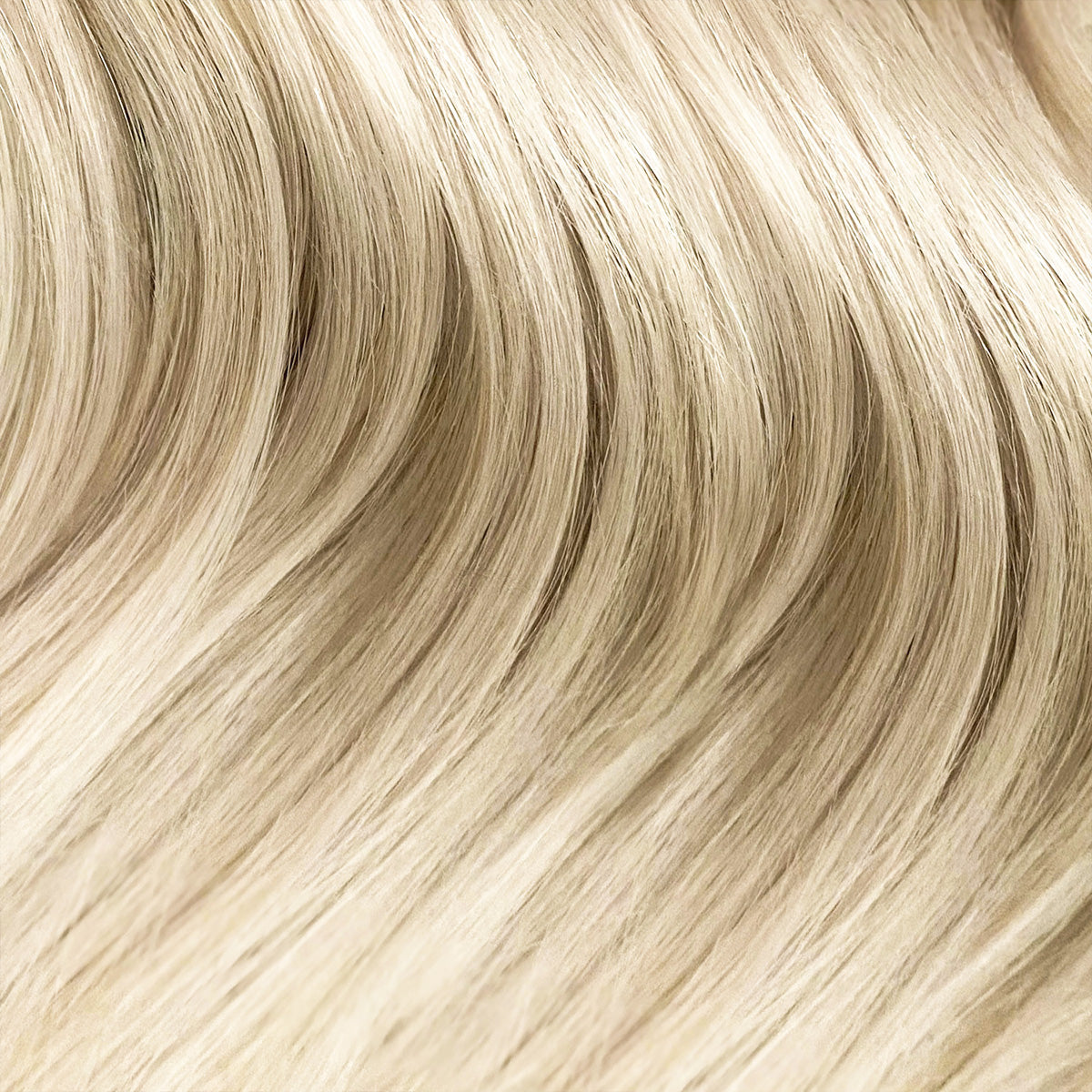 Close-up of blonde hair with a wavy texture