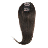 Brown hair extension with clips on a white background