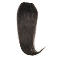 Dark brown hair extension on a white background