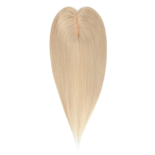 Blonde hair extension on a white background