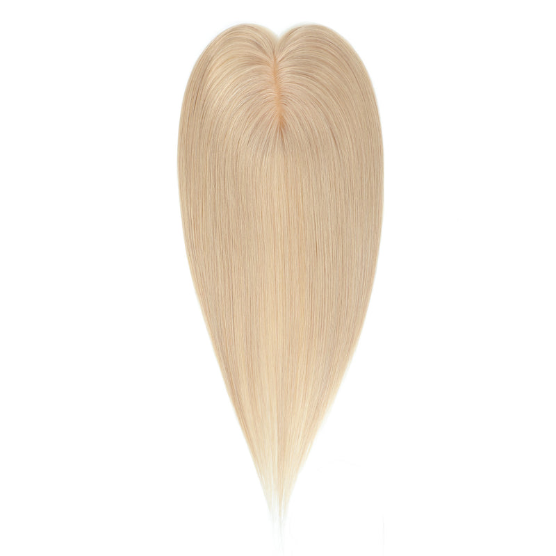 Blonde hair extension on a white background