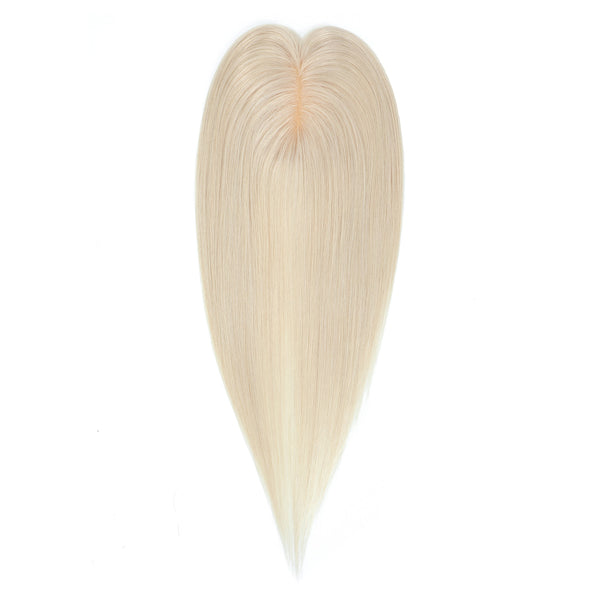 Blonde hair extension on a white background