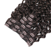Dark brown curly hair clip-in extensions with multiple rose gold metal clip attachments, laid out on a white background.
