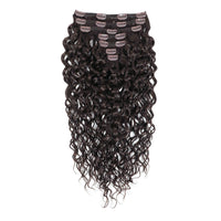7-piece clip-in hair extension set with long, dark brown to near-black body waves and a black mesh base, shown against a plain white background.