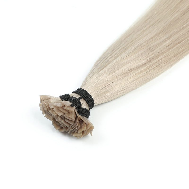 Detailed view of the bonding area of Micro Keratin Bond Hair Extensions Flat Tip