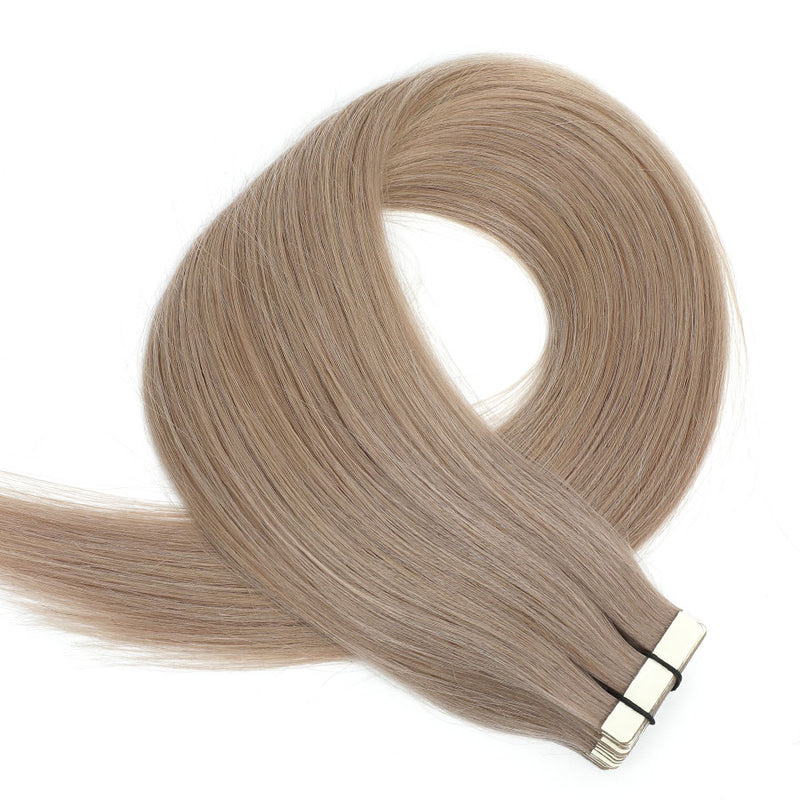 Achieve a voluminous and natural look with Human Hair Extensions. These high-quality tape extensions blend seamlessly with your natural hair, adding both length and volume.