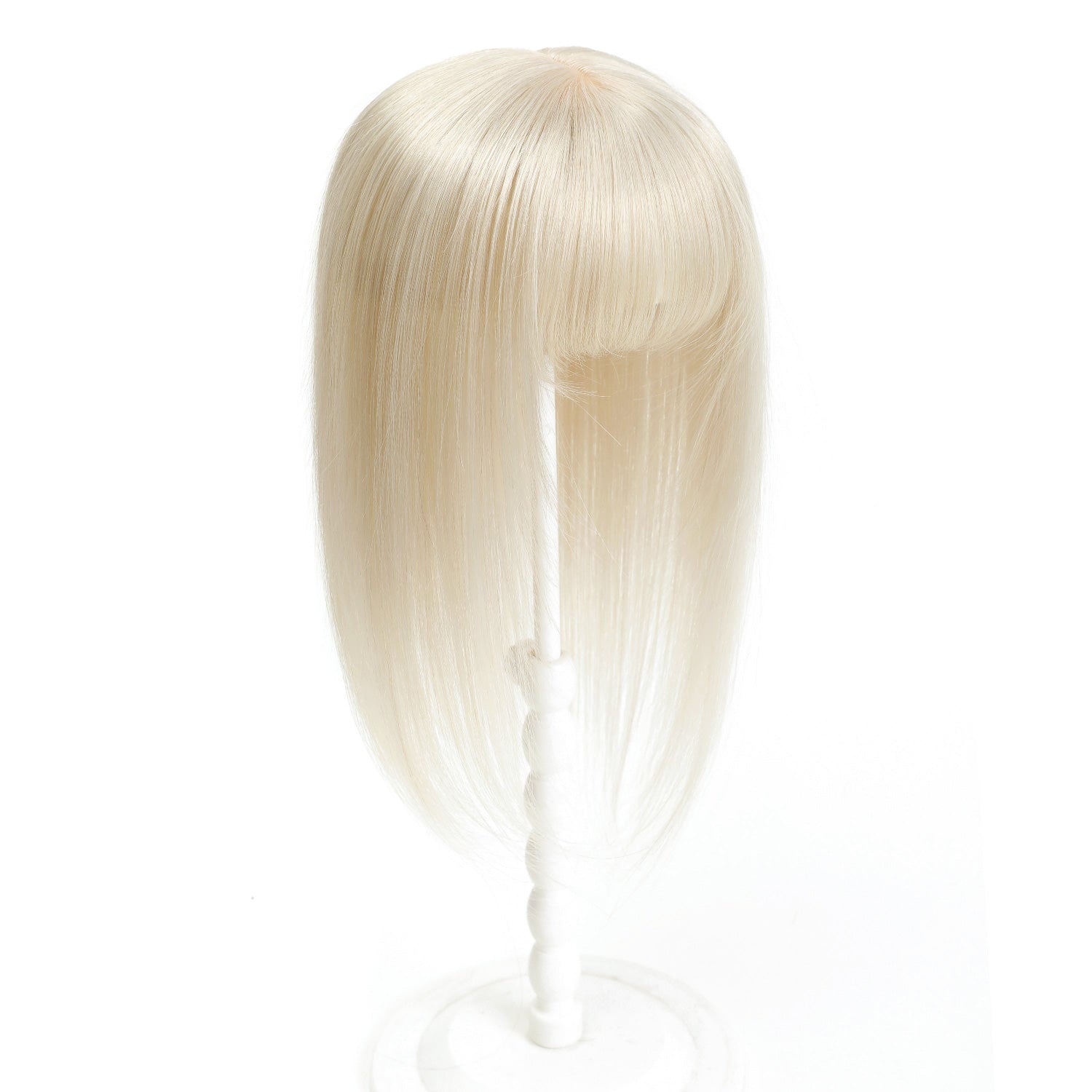 Blonde wig with a ponytail on a white background
