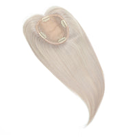 Blonde hair extension on a white background