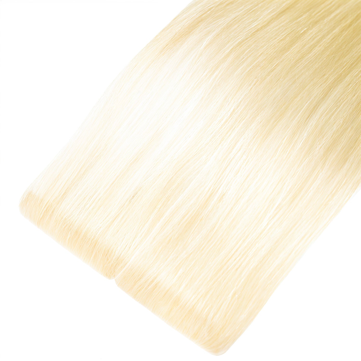 Achieve a natural look with high-quality Tape Hair extensions. These extensions blend seamlessly with your natural hair, adding both length and volume for a flawless appearance