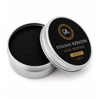 Open container of Italian Keratin glue powder with black powder inside on a white background