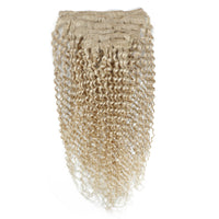 Beige textured hair extension on a white background