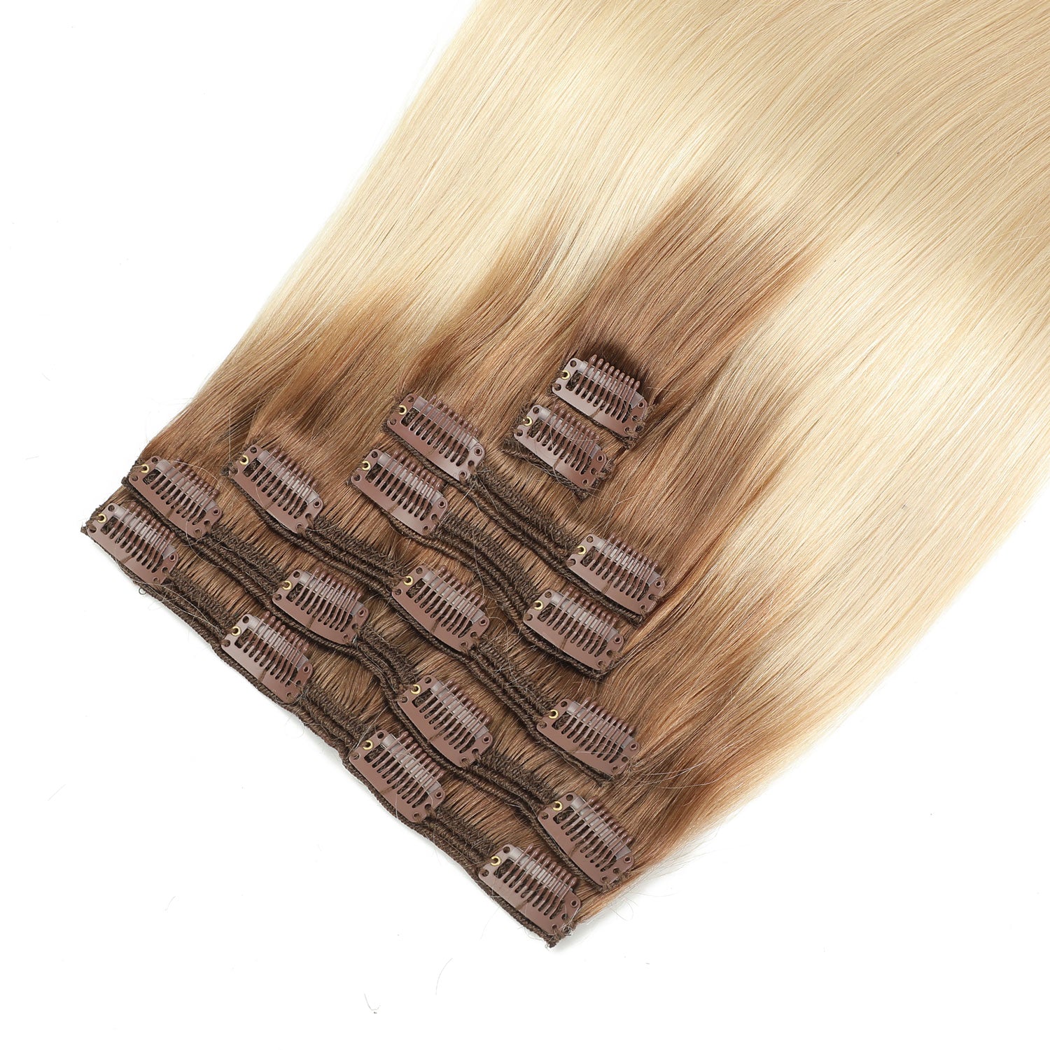 Set of hair extensions with clips on a white background