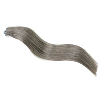 Salt and Pepper  tape hair extensions on a white background