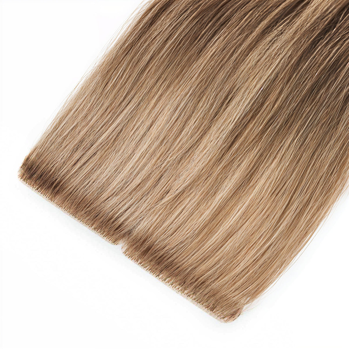 Get a natural and undetectable look with Secret Tape Hair Extensions. These high-quality extensions blend effortlessly with your natural hair, adding length and volume for a flawless appearance.