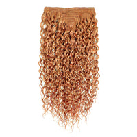 Curly hair extension in a copper color on a white background