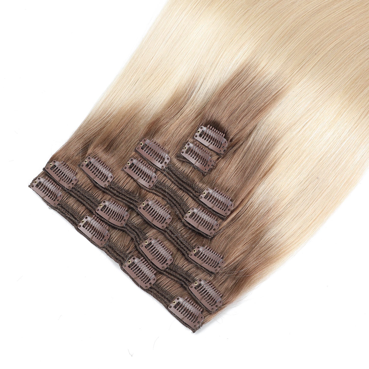 Set of hair extensions with clips on a white background